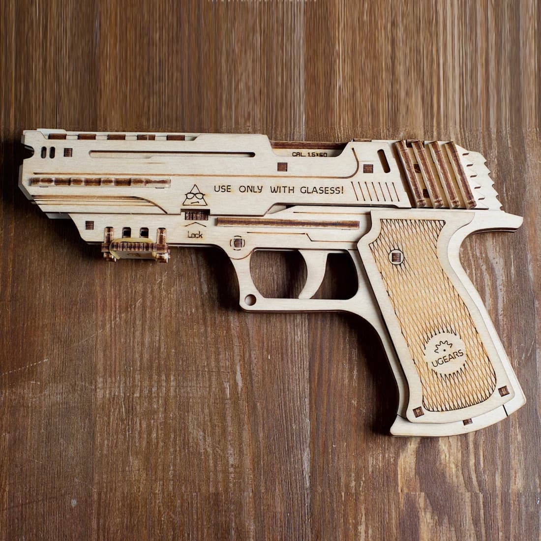 Pistol mecanic Wolf-01, Ugears, 62 piese din lemn - Imaginea 5